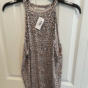 Brand new. Tags still on. Leopard print tank top.